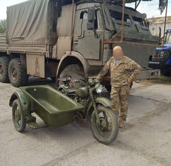 Russian Dnepr M-72 motorcycle with bathtub sidecar