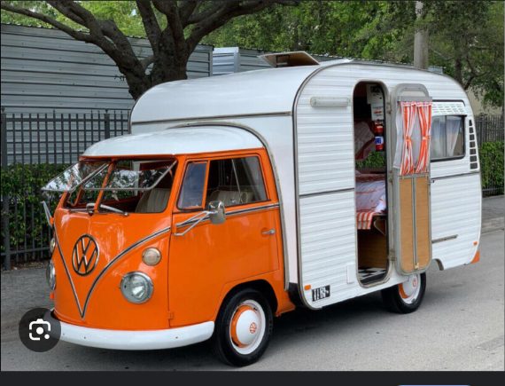 Interesting take on a camper.. A Canned Ham trailer mounted on a Vintage VW.