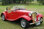 TD 2000, a product of TD Cars, a retro classic roadster . It’s a replica of the classic MG TD from the 1950s, retaining the same body shape but powered with a 2.0-litre 4-cylinder CA20E (Sourced from Nissan Pintara) and a2.0-litre 16-valve Toyota 3S-FE (Sourced from Toyota Celica)