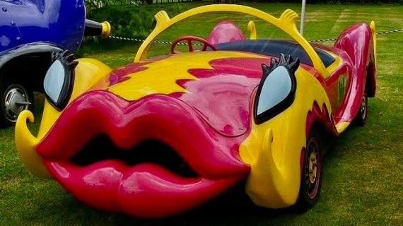 This is the “Lipstick Car”, a famous art car created by Antony Ashley in the United Kingdom.