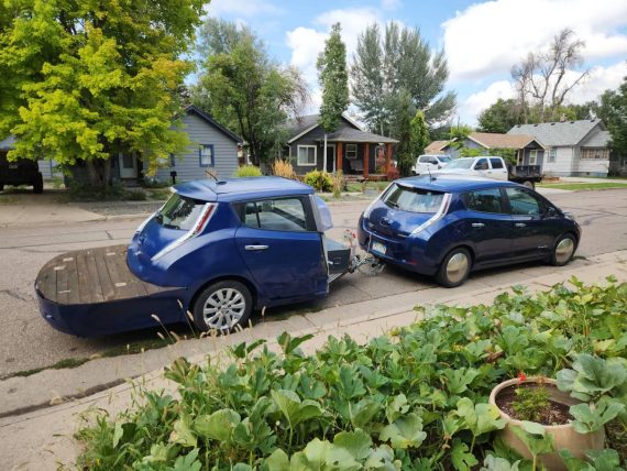 A Leaf towing a Leafette with a deck